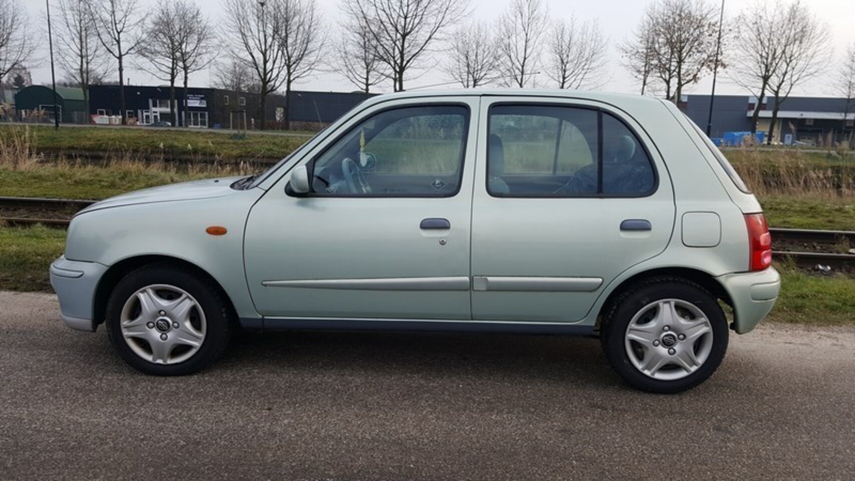 Nissan Micra - 1.0 Luxury 4 deurs Airco 62.000km! - AutoWereld.nl