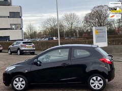 Mazda 2 - 2 1.3 XS, bj.2010, kleur:zwart, 1e eigenaar, NAP met 82016 km.en APK tot 09/2021, zeer zui