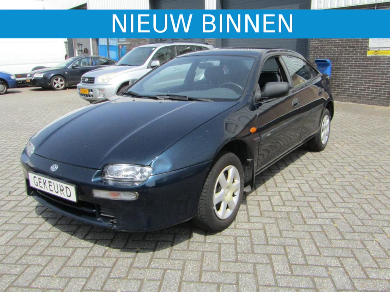 mazda-323-f-1-5i-gx-90-000-km.jpg