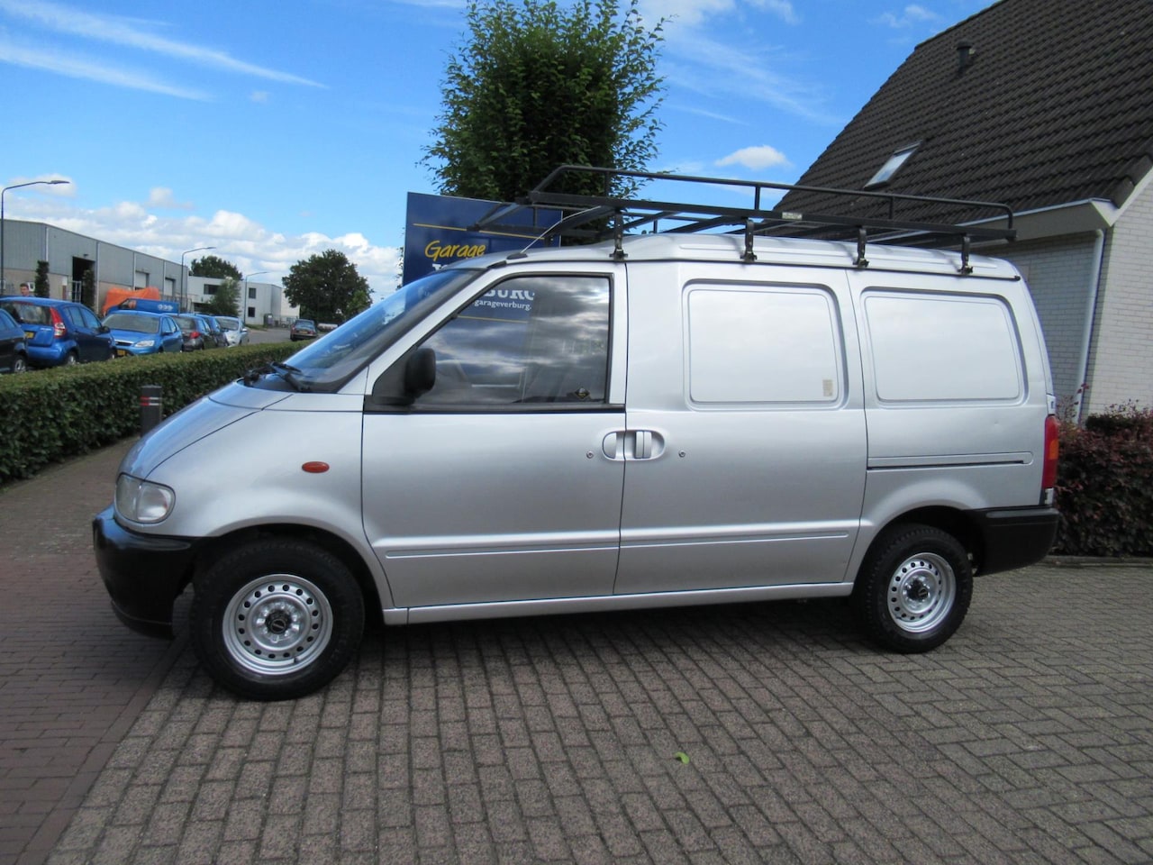 nissan-vanette-2-3-cargo-uniek-63-000-km-2x-schuifdeur-trekhaak.jpg