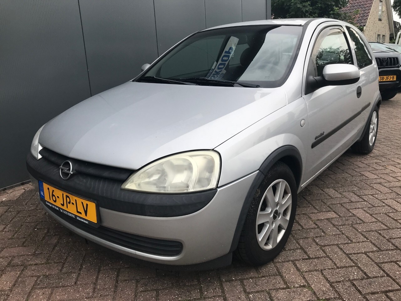 Opel Corsa - 1.2-16V Comfort