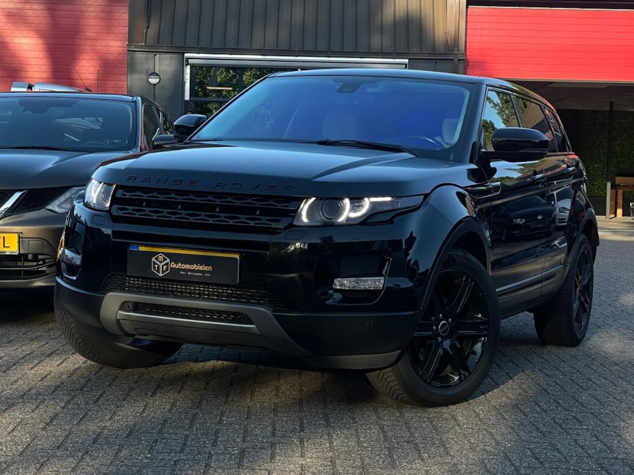 Land Rover Range Rover Evoque - 2.2 TD4 4WD Prestige 2.2 TD4 4WD Prestige - AutoWereld.nl