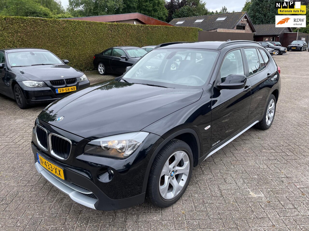 BMW X1 - SDrive20i Business|Nieuwstaat|Navigatie|Stoelverw.|Climate control|Cruise control|MF stuur - AutoWereld.nl