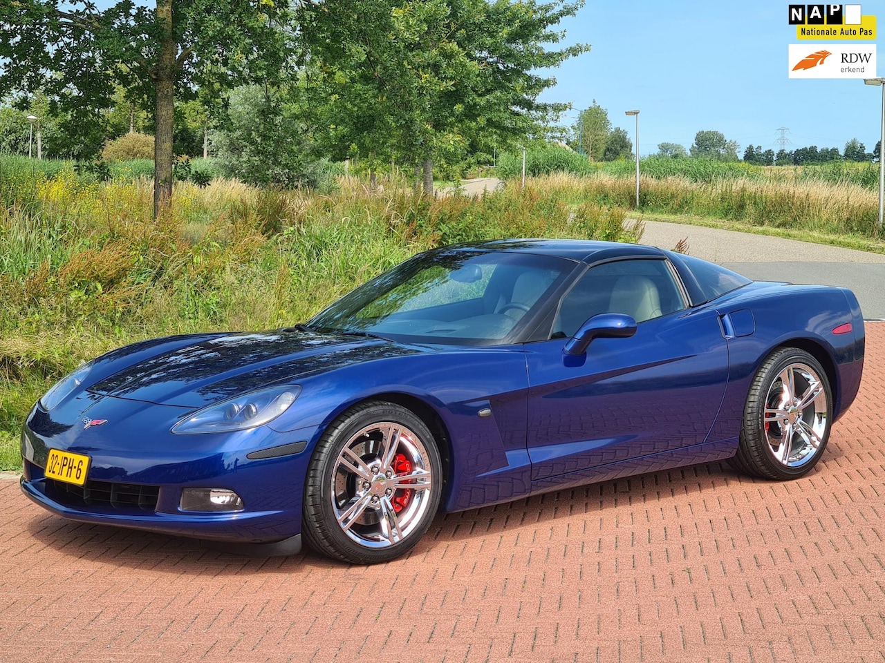 Corvette C6 - 6.0 V8 Coupé automaat 404 pk !! Borla / Transparant dak !! - AutoWereld.nl