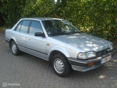 Mazda 323 - 1.5 GLX 4 drs. sedan