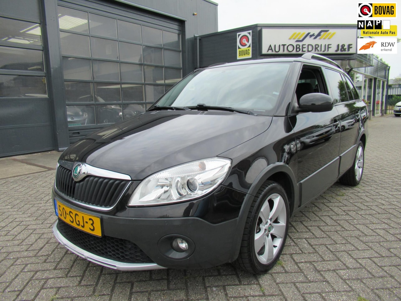 Skoda Fabia Combi - 1.2 TSI Scout / AIRCO/PDC/TREKHAAK/LMV - AutoWereld.nl