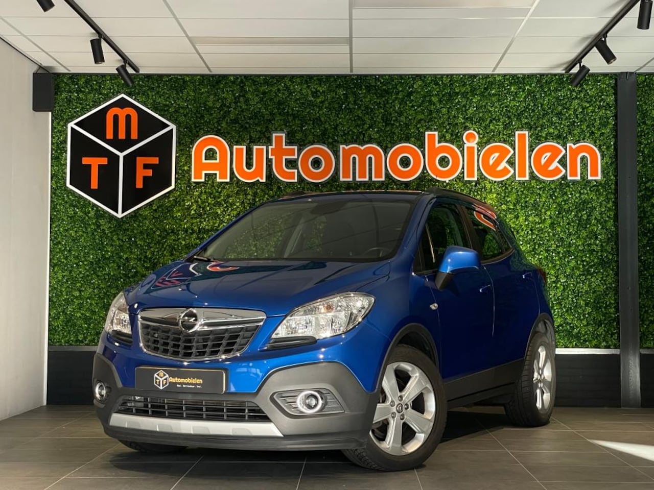 Opel Mokka - 1.4 Turbo Cosmo 4x4 - AutoWereld.nl