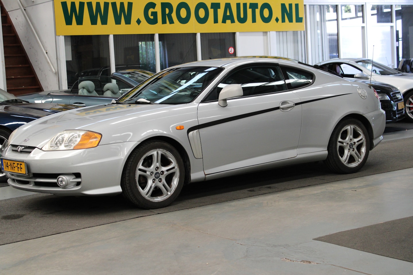 Hyundai Coupé - 2.0i-16V Dynamic Airco, Cruise Control, NAP - AutoWereld.nl