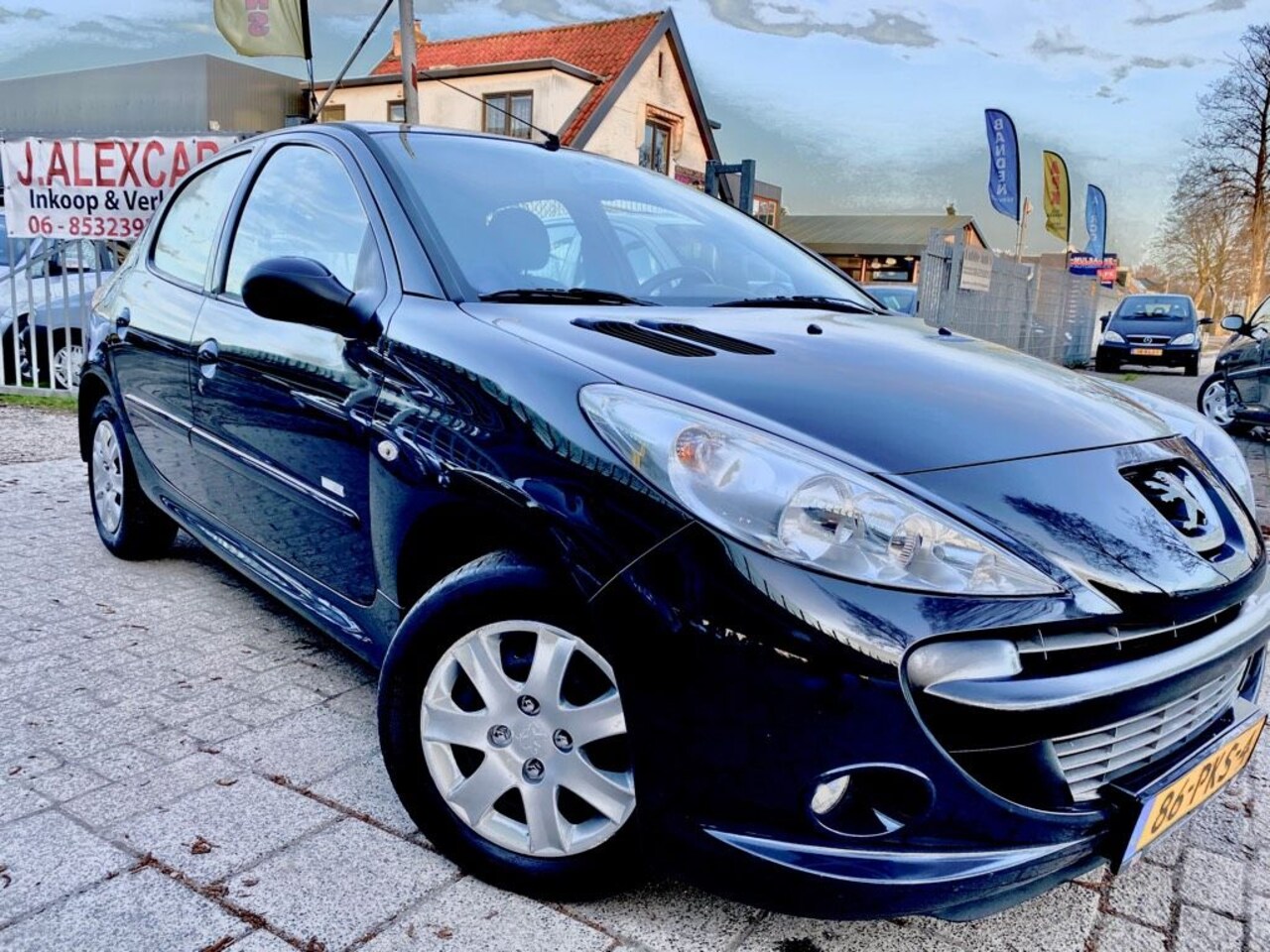 Peugeot 206 - 1.4 Millesim 200 - AutoWereld.nl