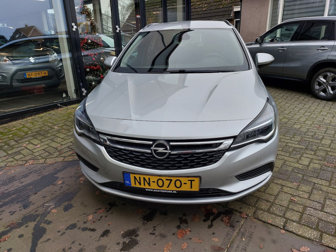 Opel Astra Sports Tourer - 1.0 Online Edition Staat in De Krim - AutoWereld.nl