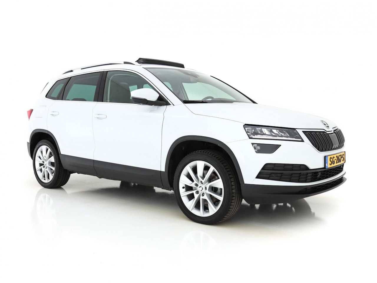 Skoda Karoq - 1.6 TDI Style Business Travel-Pack Pro *PANO+FULL-LED+VOLLEDER+NAVI-COLUMBUS+CANTON-SOUND+ - AutoWereld.nl