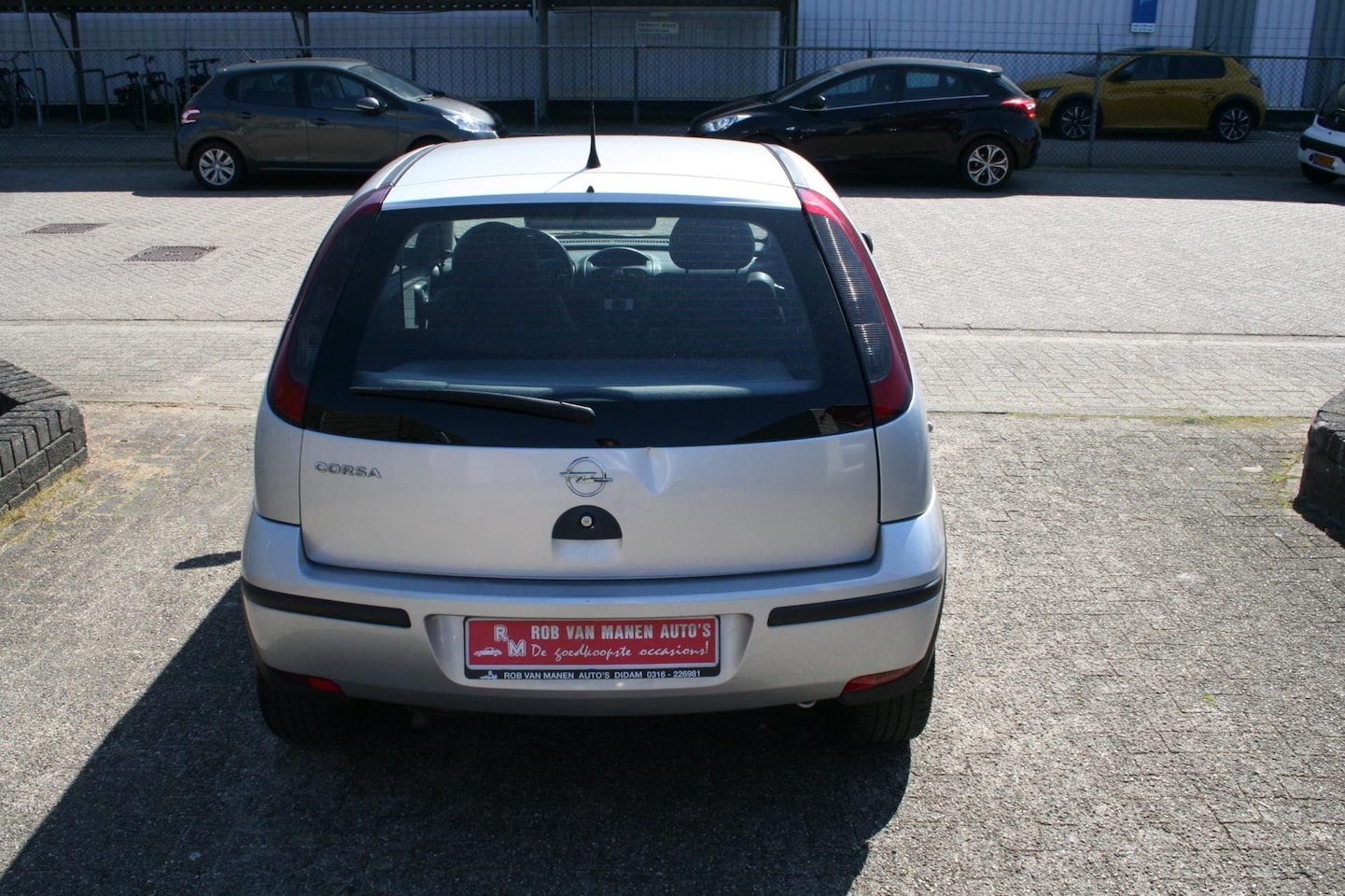 Opel Corsa - 1.0-12V Essentia