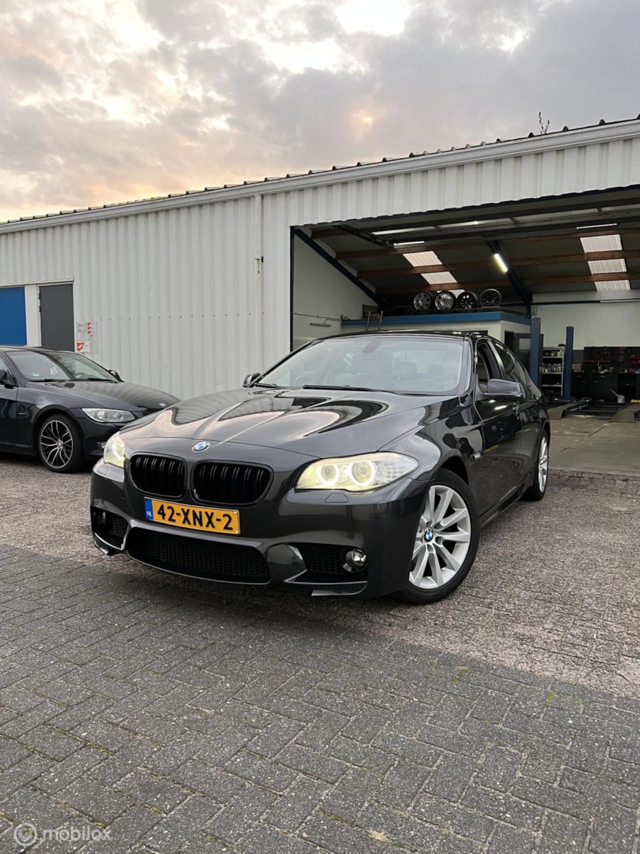 BMW 5-serie - 528i High Executive M|HUD|Keyless|Navi|Leer|AUT - AutoWereld.nl