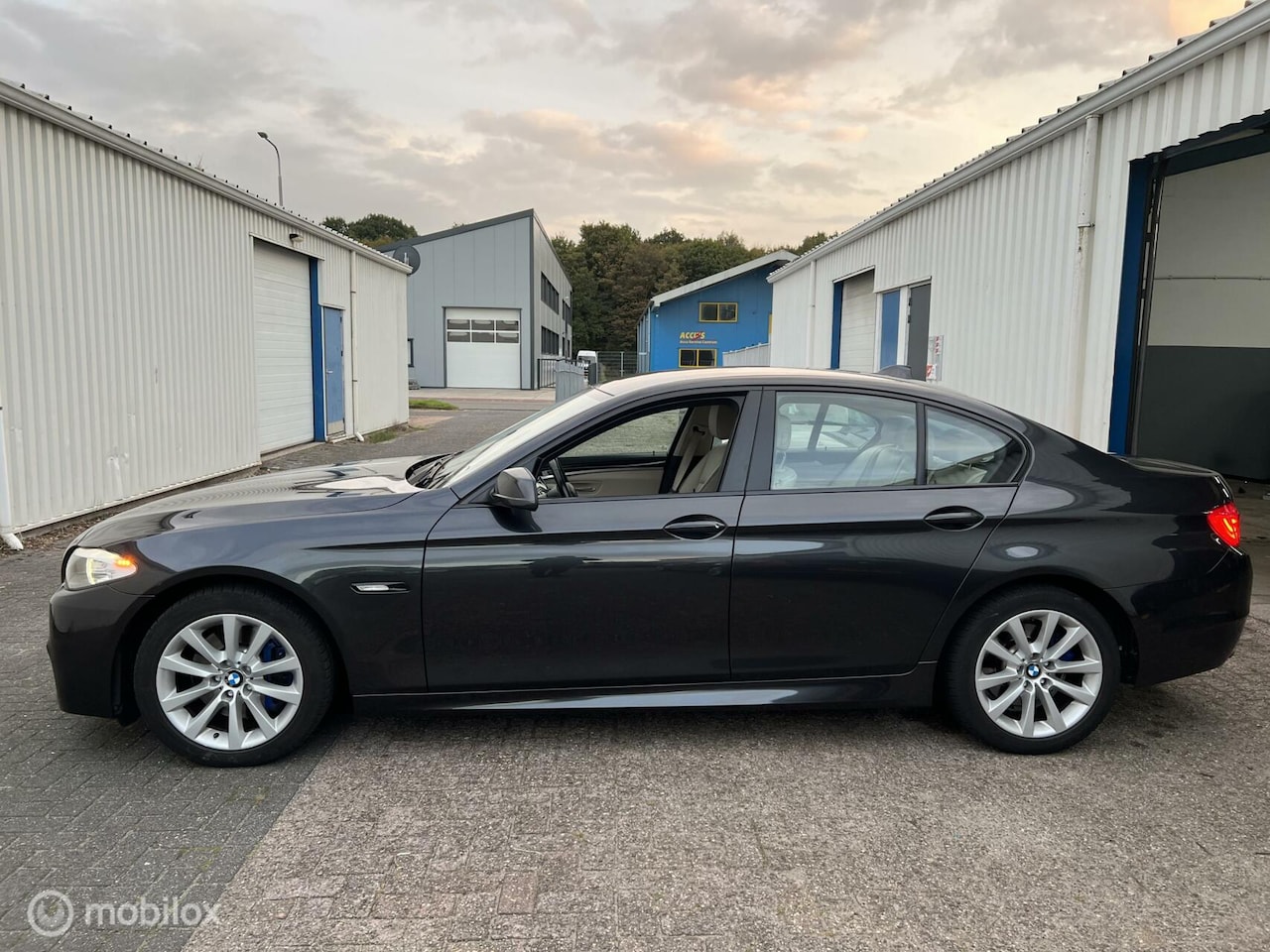 BMW 5-serie - 528i High Executive M|HUD|Keyless|Navi|Leer|AUT - AutoWereld.nl