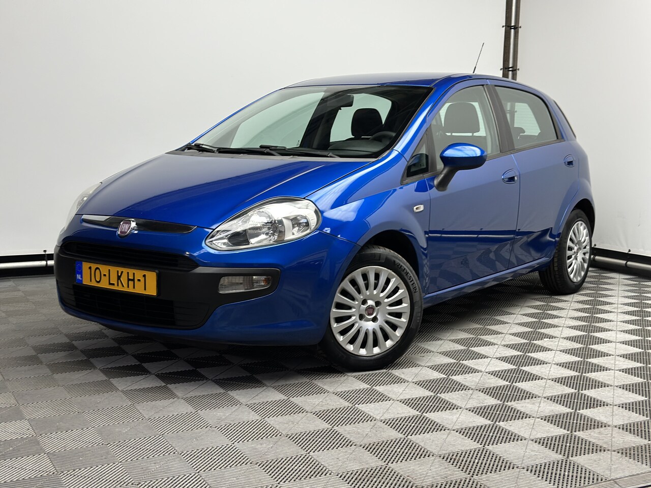 Fiat Punto Evo - 1.2 Dynamic 5-drs Airco 1e Eigenaar NL Auto - AutoWereld.nl