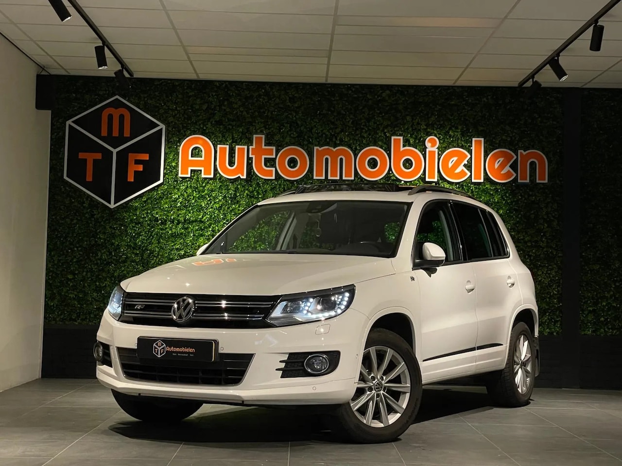 Volkswagen Tiguan - 1.4 TSI 160pk BMT Sport & Style - AutoWereld.nl