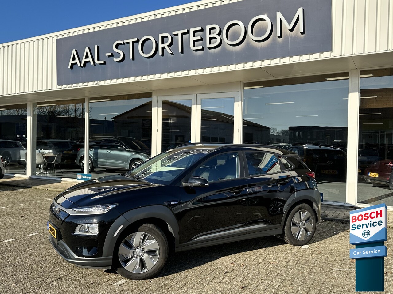 Hyundai Kona - EV Fashion 64 kWh 205PK | LED | 3-Fase | Apple Carplay | Stoel en stuurverwarming | PDC in - AutoWereld.nl