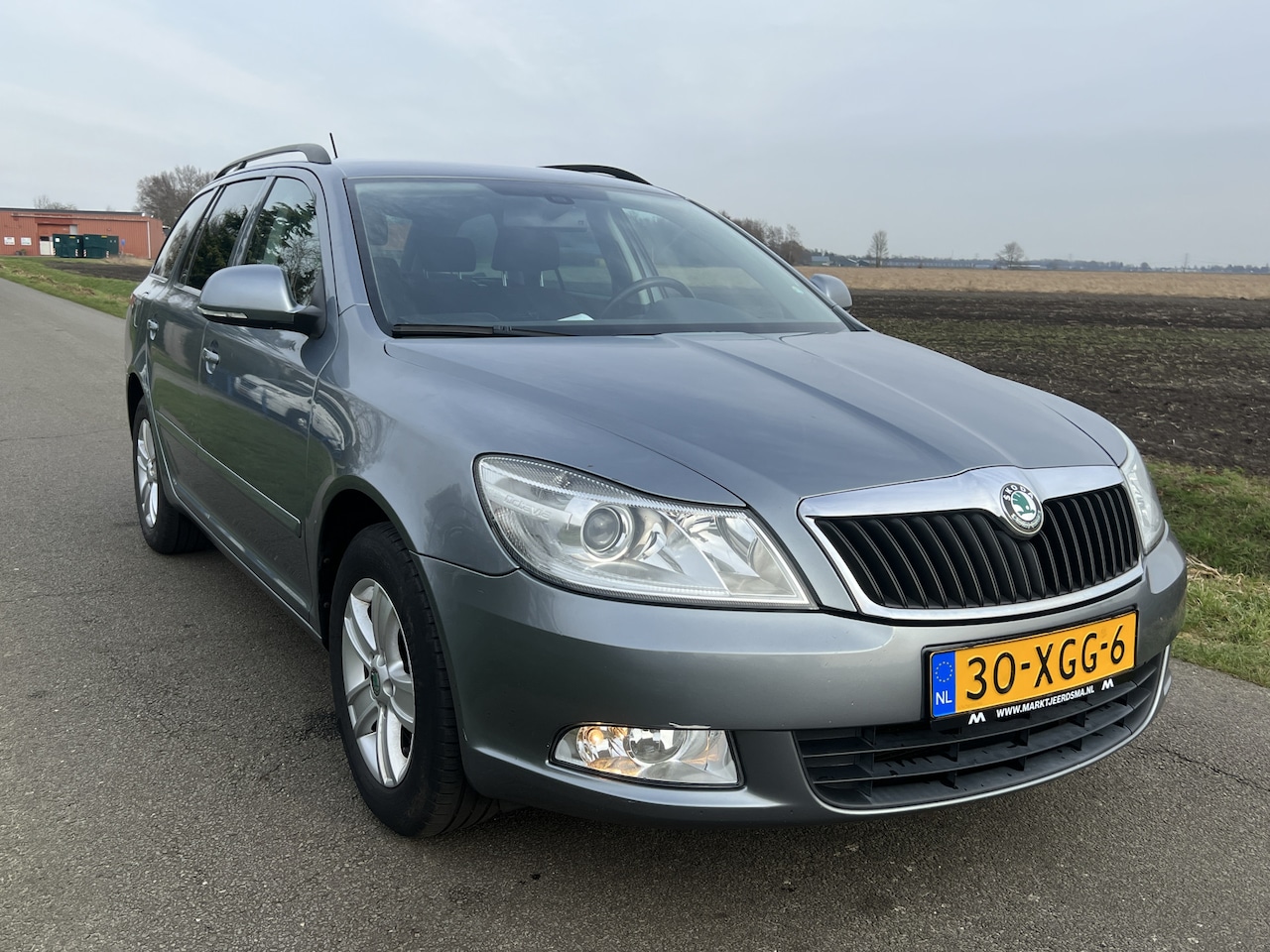 Skoda Octavia Combi - 1.2 TSI Ambition Business Line Navi / ECC / Cruise / NL-AUTO - AutoWereld.nl