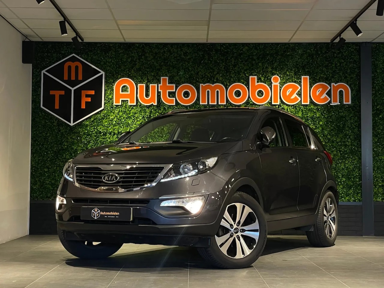 Kia Sportage - 2.0 CVVT X-clusive 2.0 CVVT X-clusive - AutoWereld.nl