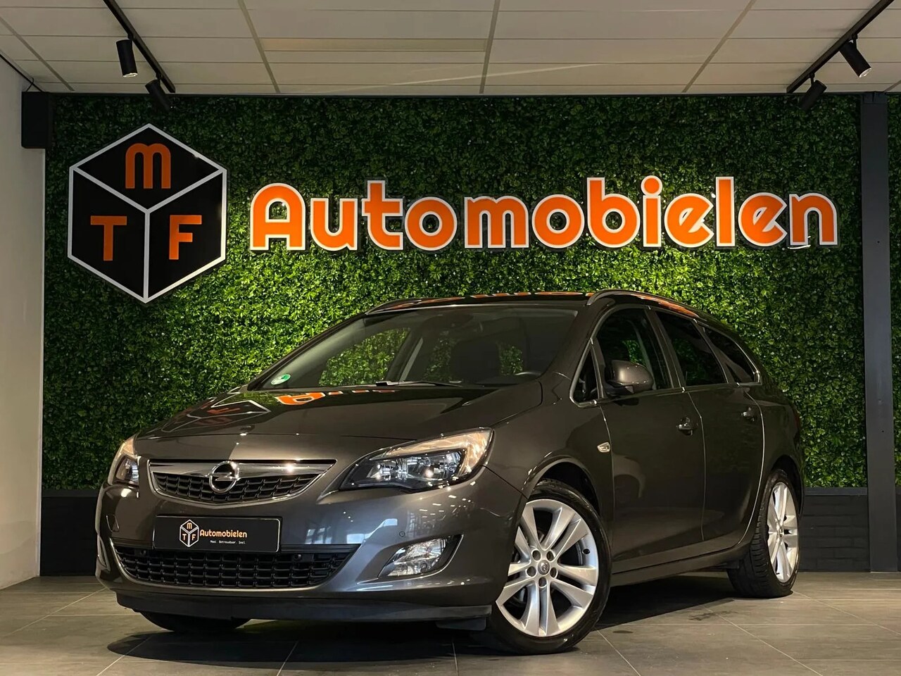 Opel Astra Sports Tourer - 1.4 Turbo Sport 1.4 Turbo 120pk Sport - AutoWereld.nl