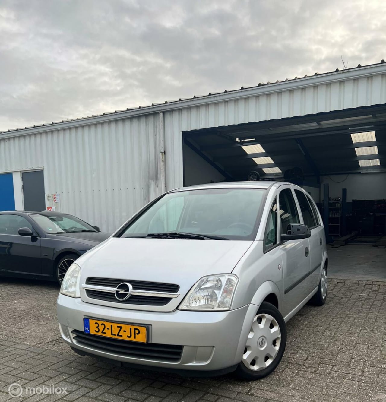 Opel Meriva - 1.6 Enjoy | APK 11-2023 | Trekhaak - AutoWereld.nl