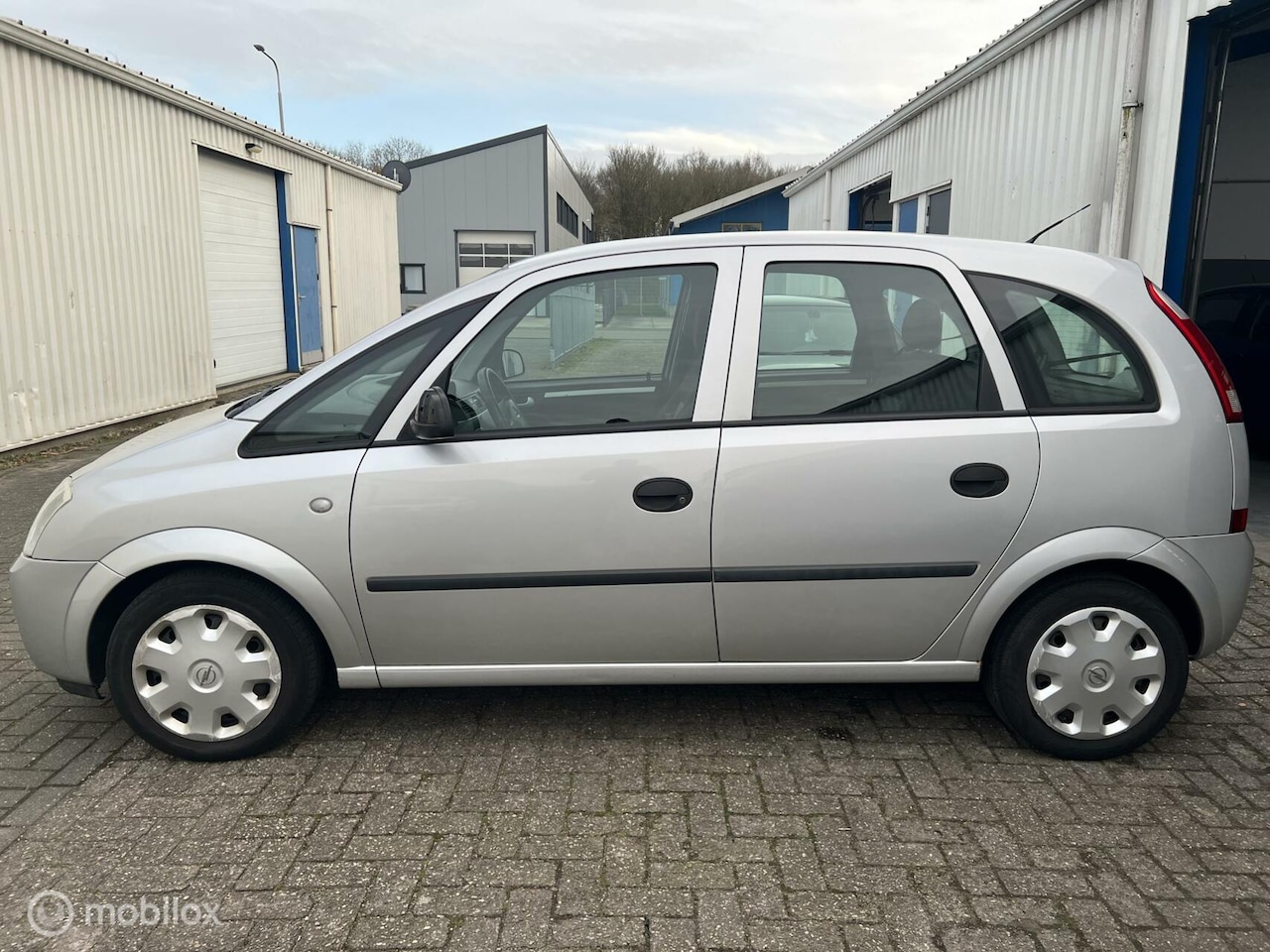 Opel Meriva - 1.6 Enjoy | APK 11-2023 | Trekhaak - AutoWereld.nl