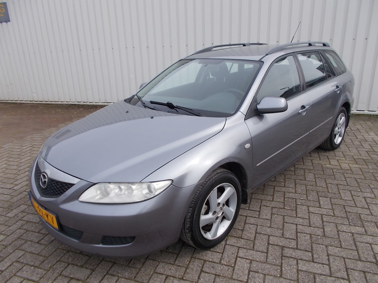 Mazda 6 Sportbreak - 1.8i Touring 1.8i Touring ( APK 19-10-2023 ) - AutoWereld.nl