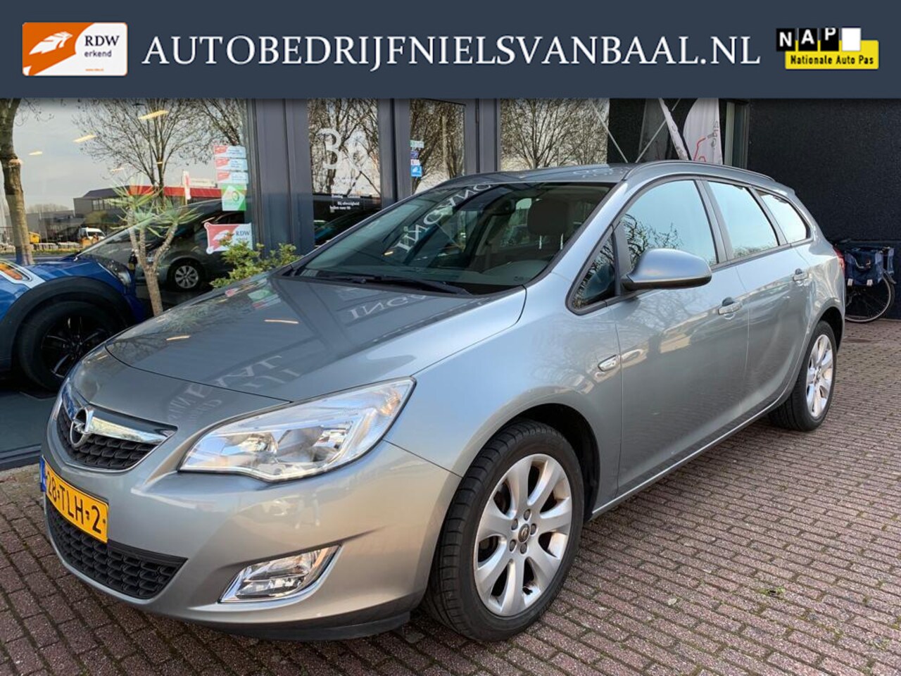 Opel Astra Sports Tourer - 1.4 Edition Clima/Navi/PDC/Cruise - AutoWereld.nl