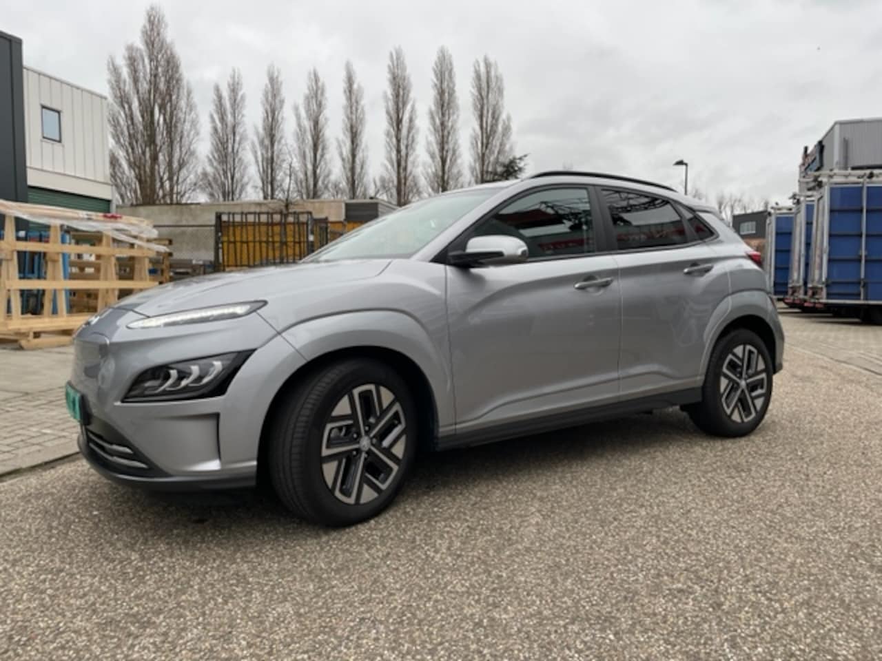 Hyundai Kona - EV Premium Sky 64 kWh Auto is zo goed als nieuw - AutoWereld.nl