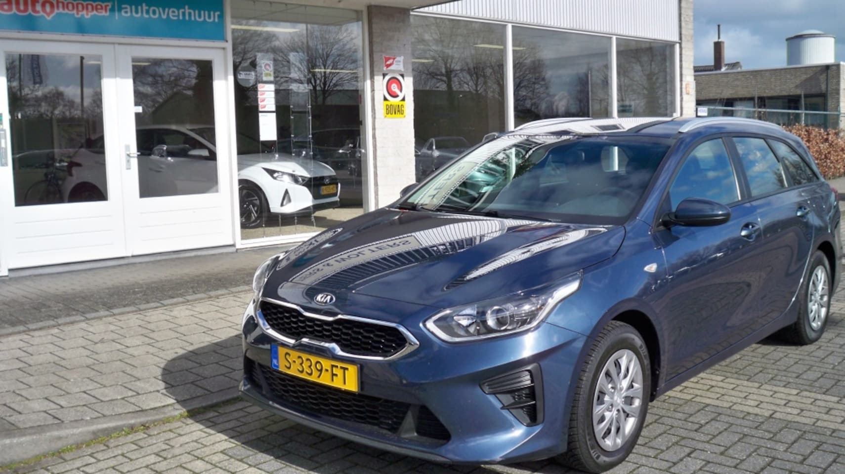 Kia Cee'd Sportswagon - 1.4 T-GDi Amber Line Airco Cruise - AutoWereld.nl