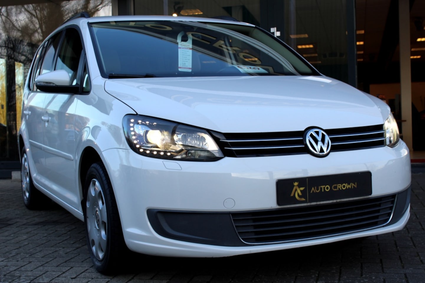 Volkswagen Touran - 1.2 TSI Trendl.BM 7persoons Navi 119.808KM! - AutoWereld.nl