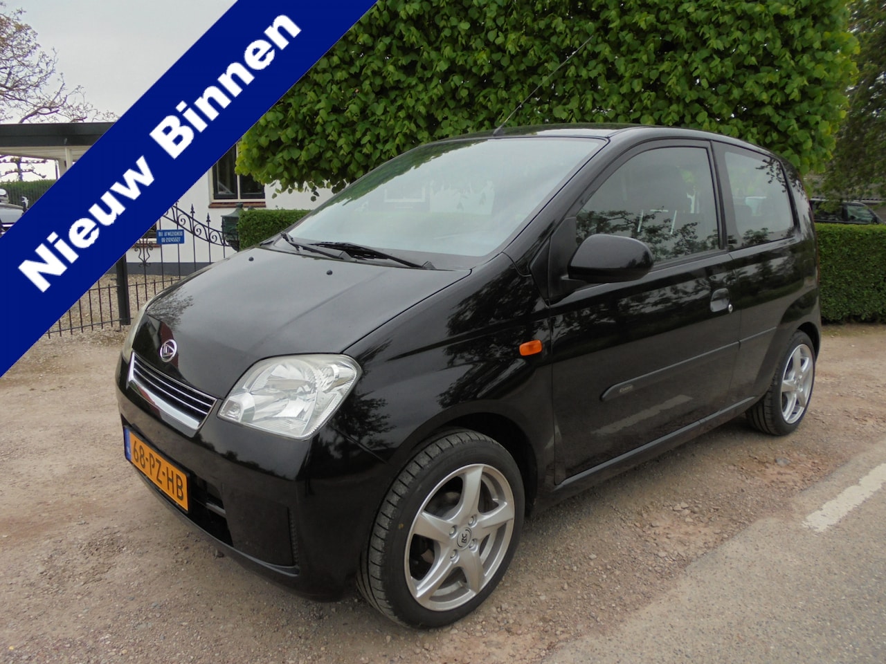 Daihatsu Cuore - 1.0-12V Nagano Sport **AIRCO**LM-VELGEN**TREKHAAK** - AutoWereld.nl