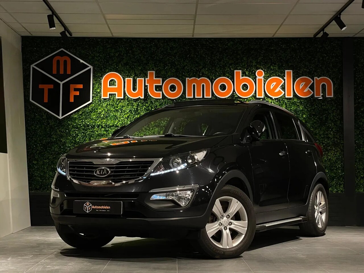 Kia Sportage - 2.0 CVVT X-ecutive 2.0 CVVT X-ecutive - AutoWereld.nl