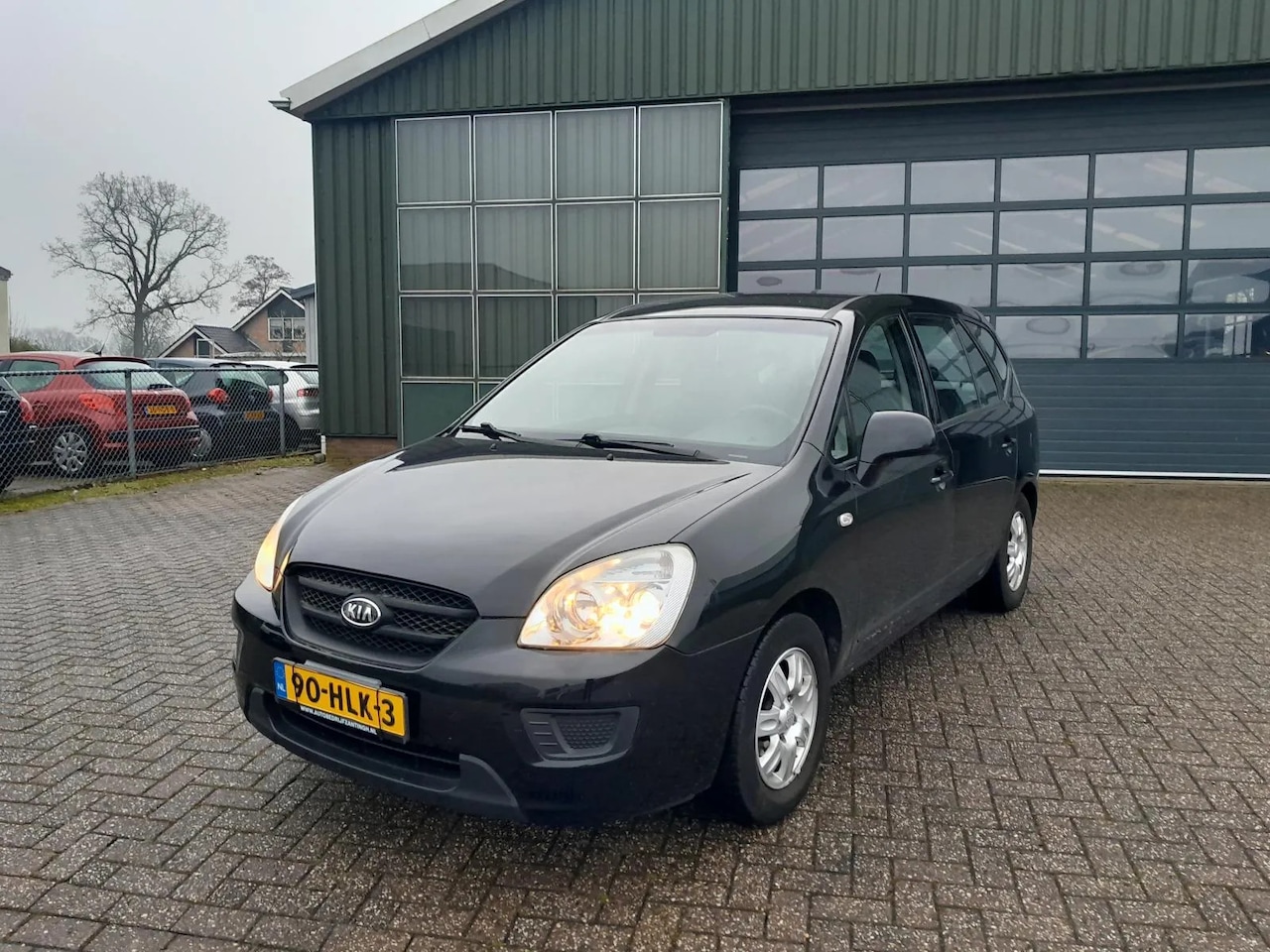 Kia Carens - 2.0 CVVT X-tra 2.0 CVVT X-tra - AutoWereld.nl