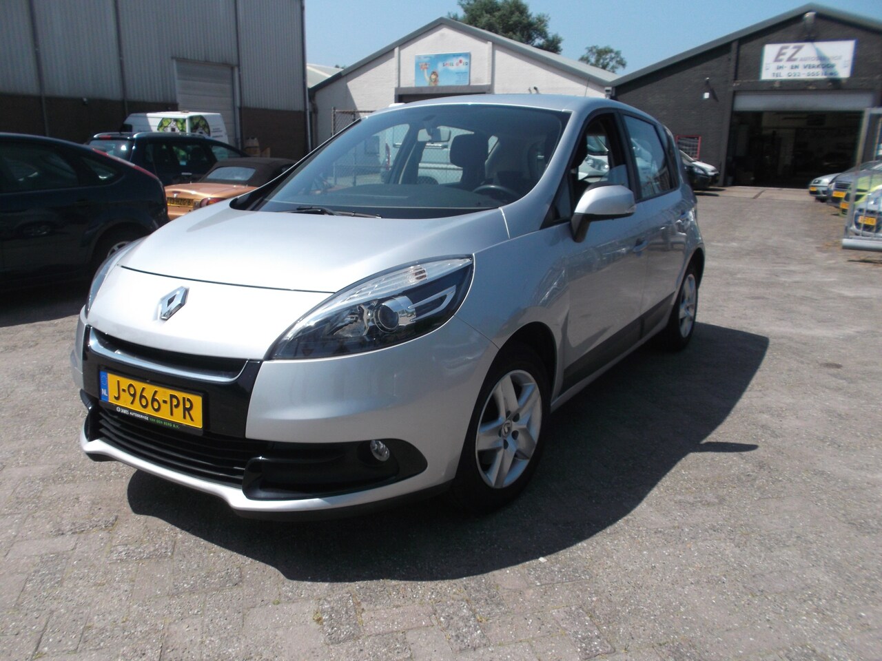 Renault Scénic - 1.6 Dynamique airco navigatie - AutoWereld.nl