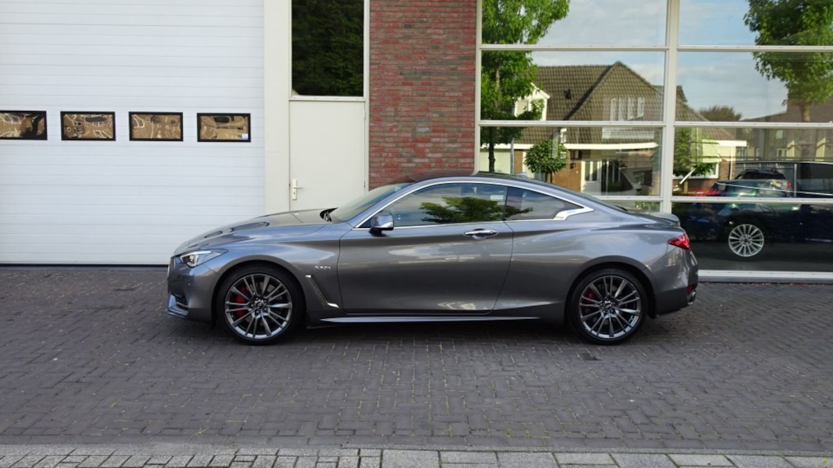 Infiniti Q60 - COUPE 3.0 V6 TURBO AWD SPORT TECH 406 PK - AutoWereld.nl