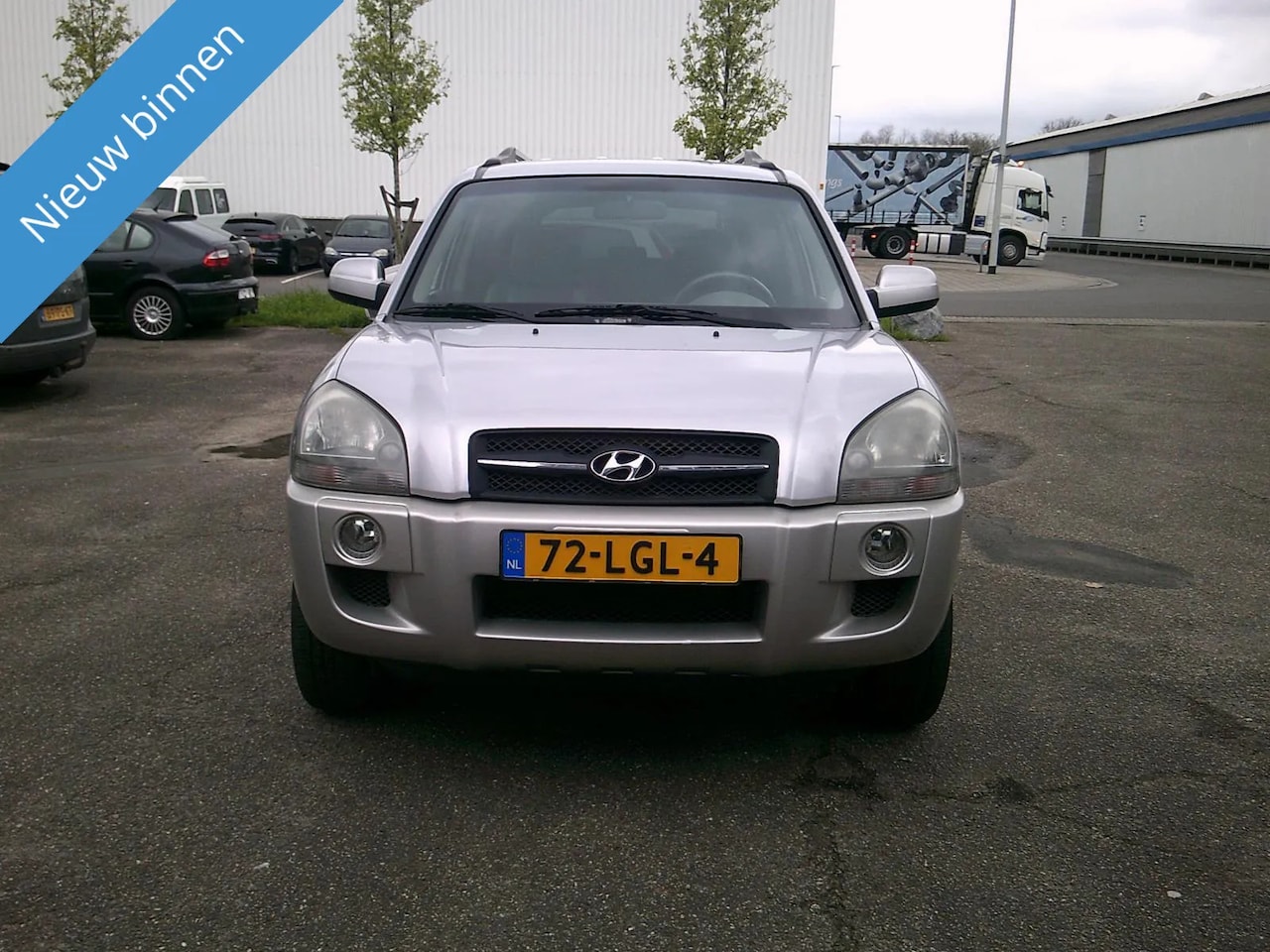 Hyundai Tucson - TUCSON; 2.0I 2WD MET LEER AIRCO - AutoWereld.nl