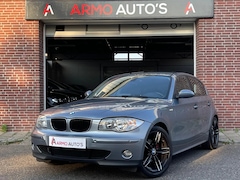 BMW 1-serie - 118i High Executive | Airco | Cruise | Navi