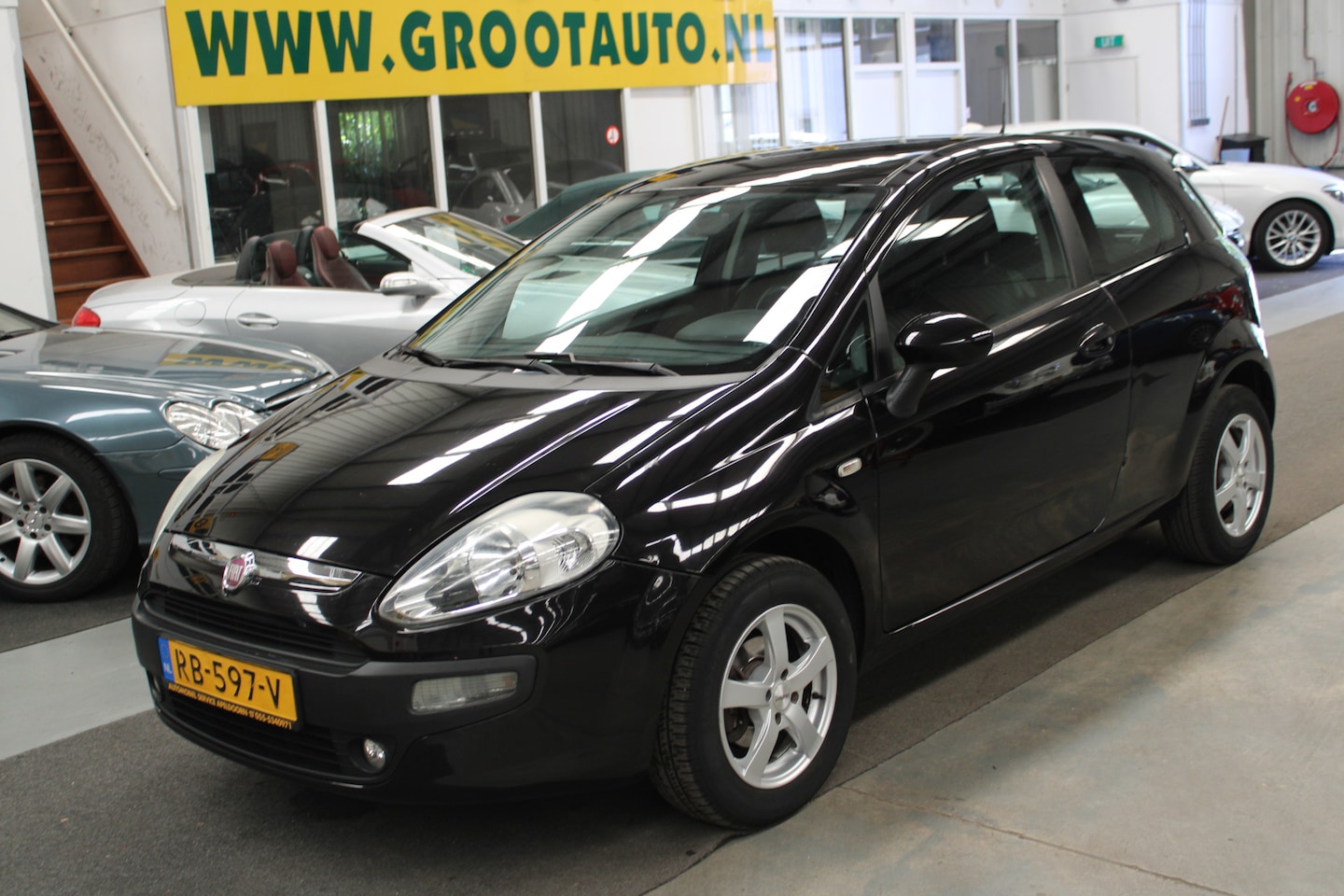 Fiat Punto Evo - 1.4 Business Airco, Stuurbekrachtiging - AutoWereld.nl