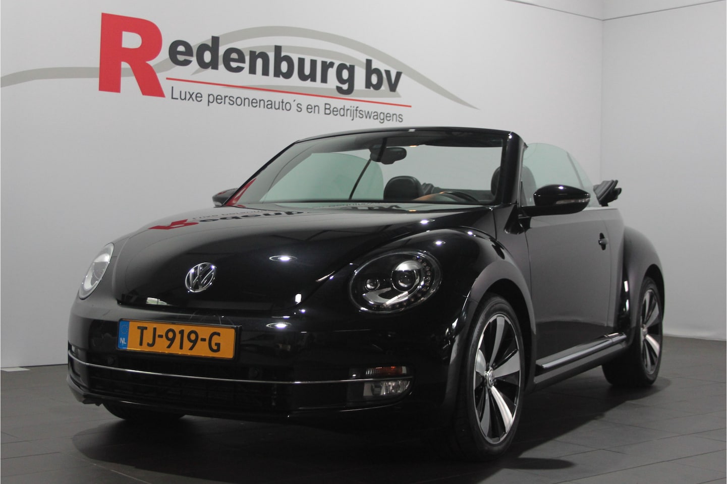 Volkswagen Beetle Cabriolet - 1.2 TSI Design BlueMotion - Navi / PDC / Stoelverw. / Cruise - AutoWereld.nl