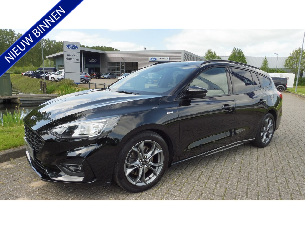 Ford Focus Wagon - 125pk ST Line Navigatie Winter-Pack Pdc Pr.Glass 17i lmv - AutoWereld.nl