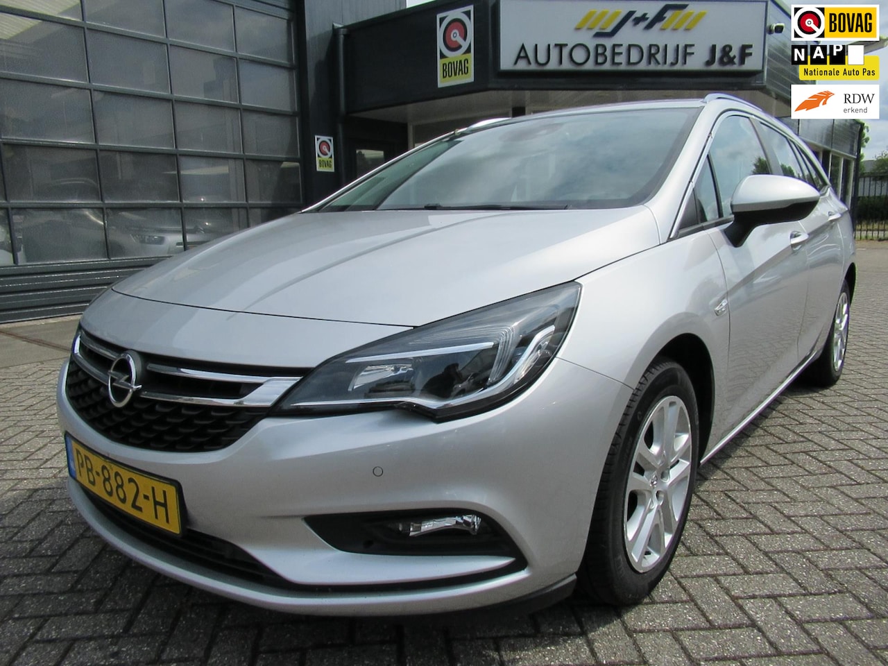 Opel Astra Sports Tourer - 1.0 Online Edition / Stoel-Stuurverwarming / AIRCO / PDC/ NAV - AutoWereld.nl