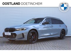 BMW 3-serie Touring - 330e xDrive High Executive M Sport Automaat / Panoramadak / Adaptief M Onderstel / Verwarm