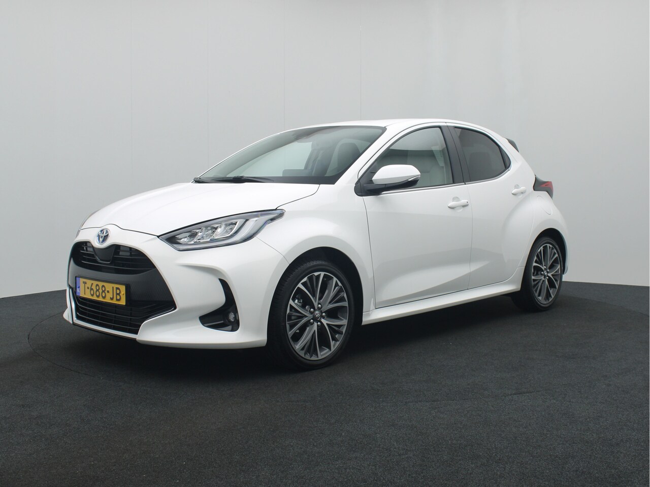 Toyota Yaris - 1.5 Hybrid Executive Limited | Nieuw direct leverbaar Lichte bekleding - AutoWereld.nl