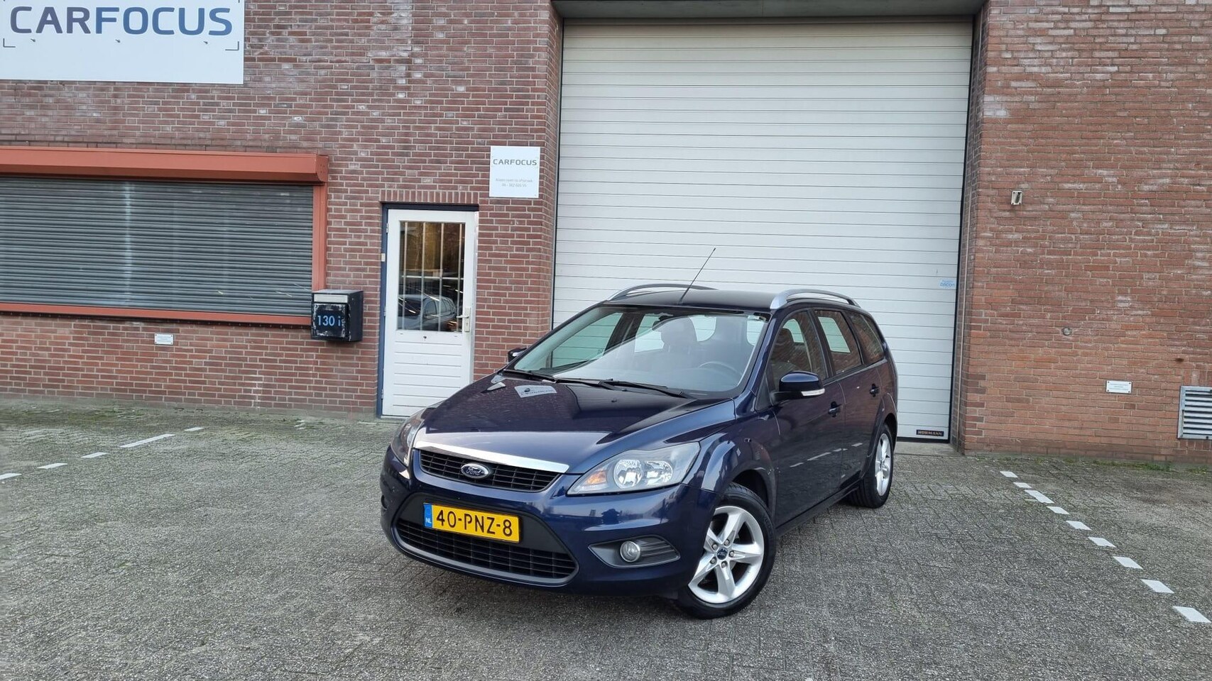 Ford Focus Wagon - 1.6 Comfort NAP Airco Cruise 03-24 APK - AutoWereld.nl