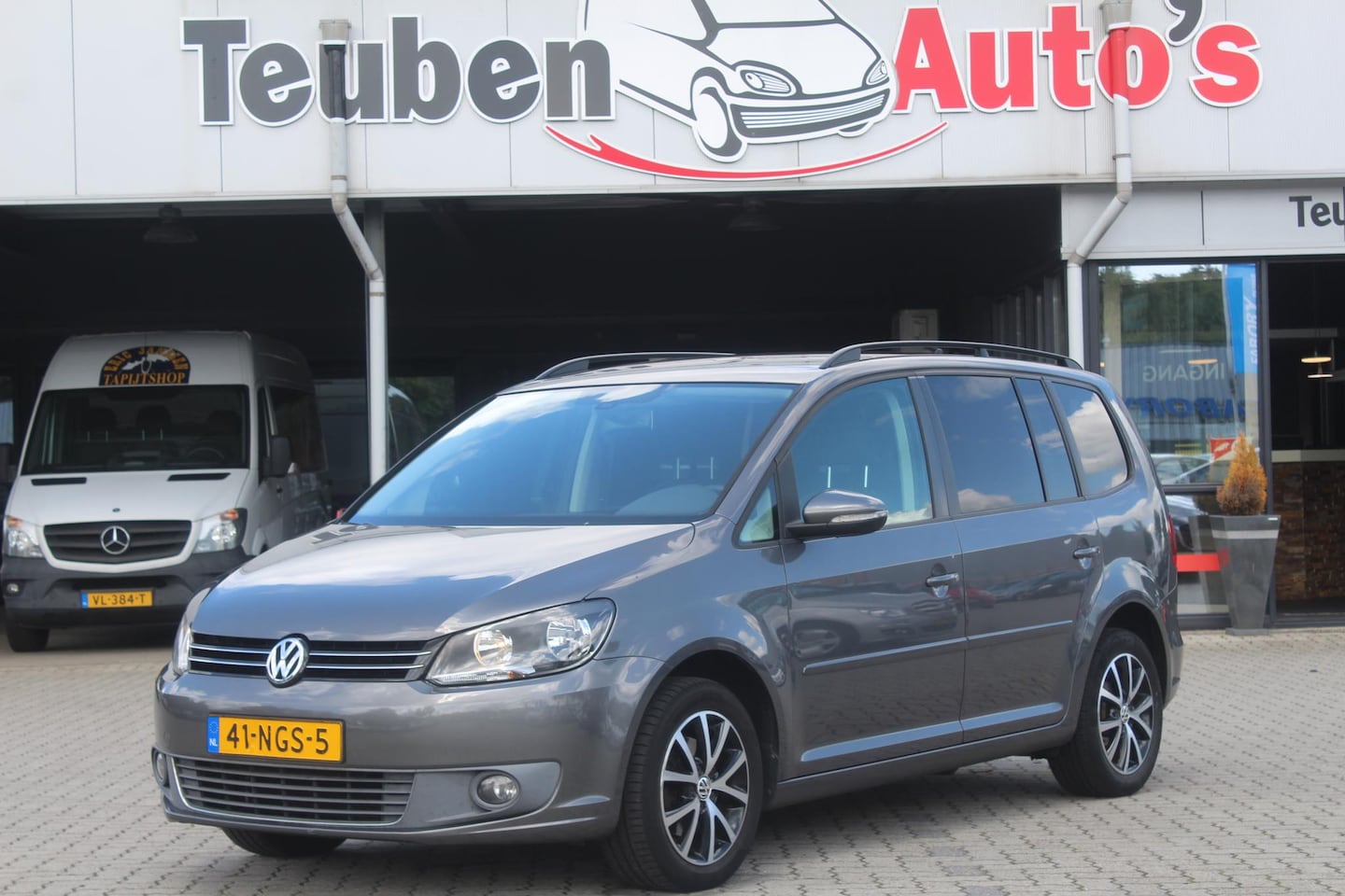 Volkswagen Touran - 1.2 TSI Comfortline BlueMotion Navigatie, Climate control, Cruise control, Trekhaak, Elekt - AutoWereld.nl