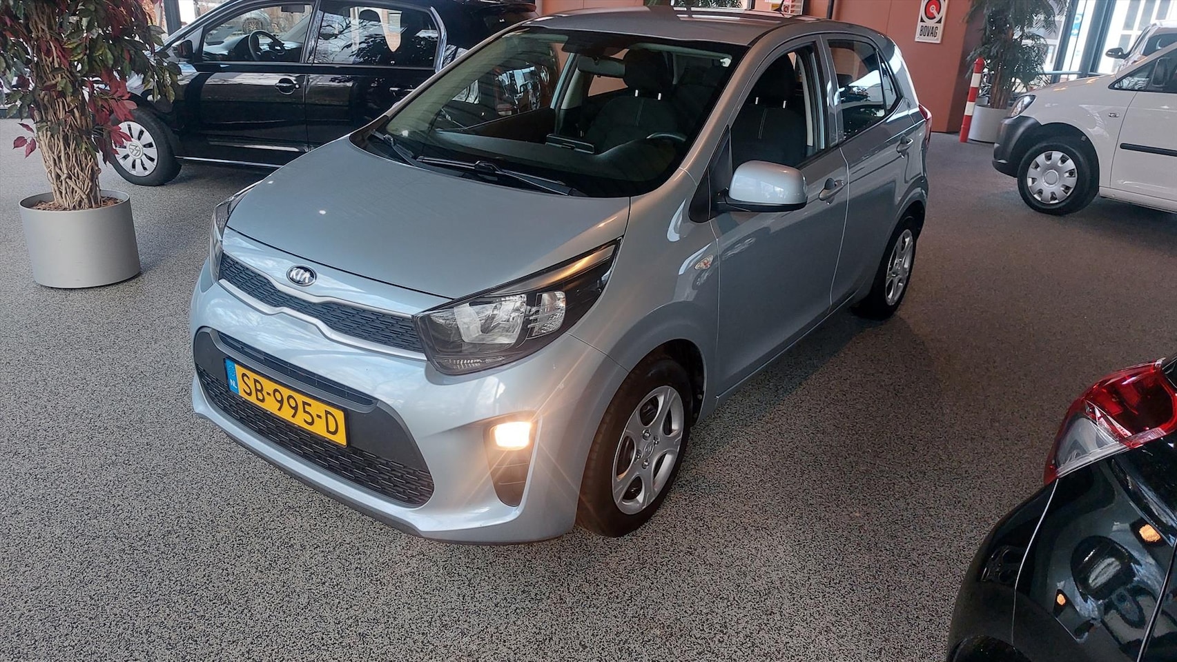 Kia Picanto - 1.0 CVVT 66 PK 5D Summer Edition - AutoWereld.nl