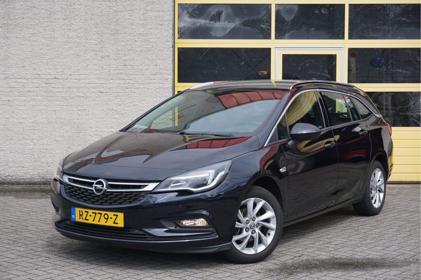Opel Astra Sports Tourer - 1.4 Turbo 150PK! Business BJ2018 Lmv 16" | Led | Pdc | Navi | Keyless entry | Climate cont - AutoWereld.nl