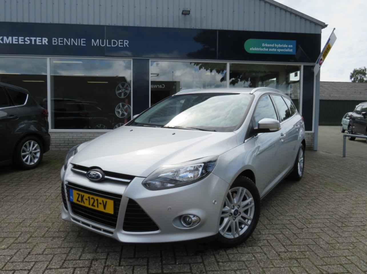 Ford Focus Wagon - 1.6 EcoBoost Titanium 150 PK / NAVI / TREKHAAK - AutoWereld.nl