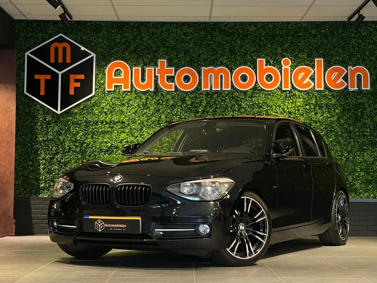 BMW 1-serie - 116i Sport line ed. - AutoWereld.nl